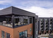 Thumbnail 28 of 35 - rooftop lounge of apartments in centennial co