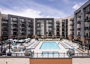 Thumbnail 27 of 35 - wide shot of pool at centennial apartment complex
