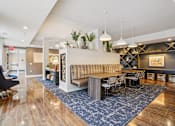 Thumbnail 31 of 42 - Modern living room with wooden floor at Arcata Apartments, Minnesota, 55416