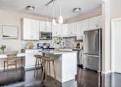 Thumbnail 6 of 33 - 71 France Edina MN-White Cabinetry with Granite Counter-tops Stainless Steel Appliances1