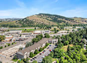 Thumbnail 24 of 24 - an aerial view of a city with a mountain in the background