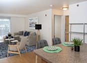 Thumbnail 1 of 11 - Kitchen and Living Room