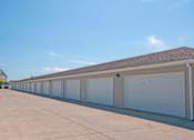 Thumbnail 10 of 11 - Outdoor Garage with Many Doors