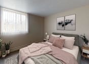 Thumbnail 10 of 22 - Bedroom with Bed, Nightstands and Window