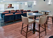 Thumbnail 20 of 24 - Theater Room with Stadium Seating and Tall Tables