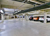 Thumbnail 23 of 24 - Underground Garage with Parked Cars