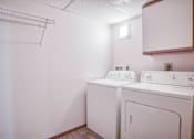 Thumbnail 6 of 18 - our apartments have a washer and dryer in the living room and laundry room
