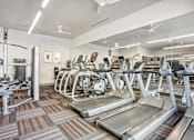 Thumbnail 16 of 24 - our state of the art fitness center is equipped with cardio equipment and weights for fitness