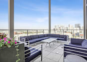 Thumbnail 13 of 24 - Relax on the patio while taking in views of Denver and the Rocky Mountains