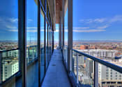 Thumbnail 14 of 24 - Sky lounge balcony, with concrete pillars and walkway and glass railing