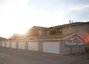 Thumbnail 8 of 10 - Large driveway with detached garage parking.