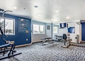 Thumbnail 8 of 18 - the exercise room at the house