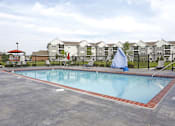 Thumbnail 10 of 21 - Outdoor Swimming Pool and Sun Deck