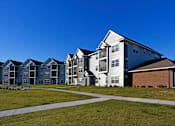 Thumbnail 21 of 21 - Exterior Cypress Court Apartments Building