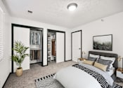 Thumbnail 8 of 20 - Bedroom with Bed and Closet Space