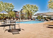 Thumbnail 10 of 20 - Outdoor Pool and Sundeck with Chairs