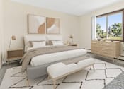 Thumbnail 5 of 18 - a bedroom with a bed and a large window