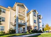 Thumbnail 13 of 24 - Exterior of Homestead Garden building with private balconies or patios to enjoy a gorgeous view.
