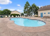 Thumbnail 8 of 24 - our resort style pool is next to our building and has chairs around it