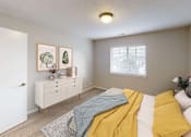Thumbnail 17 of 33 - Spacious bedroom with a large window letting in natural light.