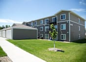 Thumbnail 12 of 15 - Outdoor Car Garage and Legacy Heights Exterior