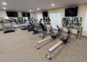 Thumbnail 8 of 15 - the gym at the village apartments