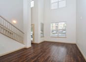 Thumbnail 25 of 40 - Multilevel unit with high ceilings, plenty of natural light from +3 windows, and gorgeous wood flooring.
