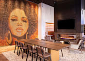 Thumbnail 5 of 40 - a conference room with a large painting of a woman on the wall
