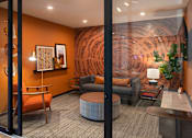 Thumbnail 36 of 40 - a living room with orange walls and a large mural on the wall