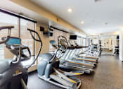 Thumbnail 14 of 27 - Fitness center with hard rubber flooring, 3 treadmills and 2 ellipticals