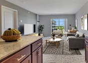 Thumbnail 4 of 24 - an open floor plan with a living room and a kitchen