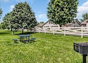 Thumbnail 9 of 11 - our yard has a picnic table and a grill and a fence