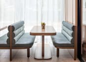 Thumbnail 44 of 58 - a table and two chairs in front of a window