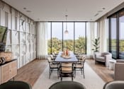 Thumbnail 53 of 58 - a dining room with a long dining table and a large window