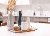 Thumbnail 5 of 58 - a kitchen table with a vase of wheat on it