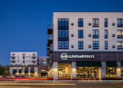 Thumbnail 3 of 58 - a large white building with a sign that reads lubbock brewers on the front of it