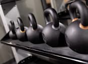 Thumbnail 49 of 58 - a row of dumbbells on a shelf