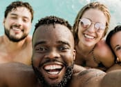 Thumbnail 19 of 34 - a group of people in a swimming pool
