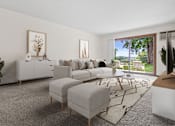Thumbnail 8 of 24 - A living room with a grey rug and a white sofa.