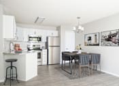 Thumbnail 1 of 28 - Stunning kitchen with stainless steel appliances, white cabinets and plenty of room