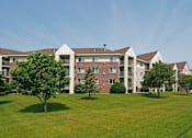 Thumbnail 20 of 20 - Exterior Quarry Ridge Apartments Building and Lawn