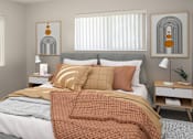 Thumbnail 6 of 20 - a bedroom with a bed and two windows