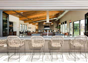 Thumbnail 21 of 40 - Clubhouse with Outdoor Lounge Area with Chef's Table views 