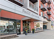 Thumbnail 19 of 40 - a building with a sign that reads red 264 8th street