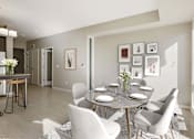 Thumbnail 3 of 40 - Elegant dining space lit by large window next to the table.