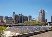 Thumbnail 35 of 40 - View of Minneapolis skyline featuring the Mississippi River Trails.