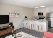 Thumbnail 11 of 28 - Studio unit with open concept kitchen and living area.