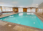 Thumbnail 15 of 28 - the indoor pool at the resort is heated and has seating around it