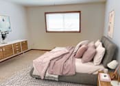 Thumbnail 7 of 17 - Bedroom with Bed and Windows for Natural Light