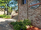 Thumbnail 23 of 23 - River Pointe sign on brick wall next to entryway